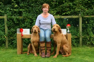 Charlie, Hercules and proud mum Jenny amidst the days winnings.