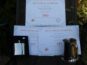 North and Billie's annual awards together with North's two trophies.